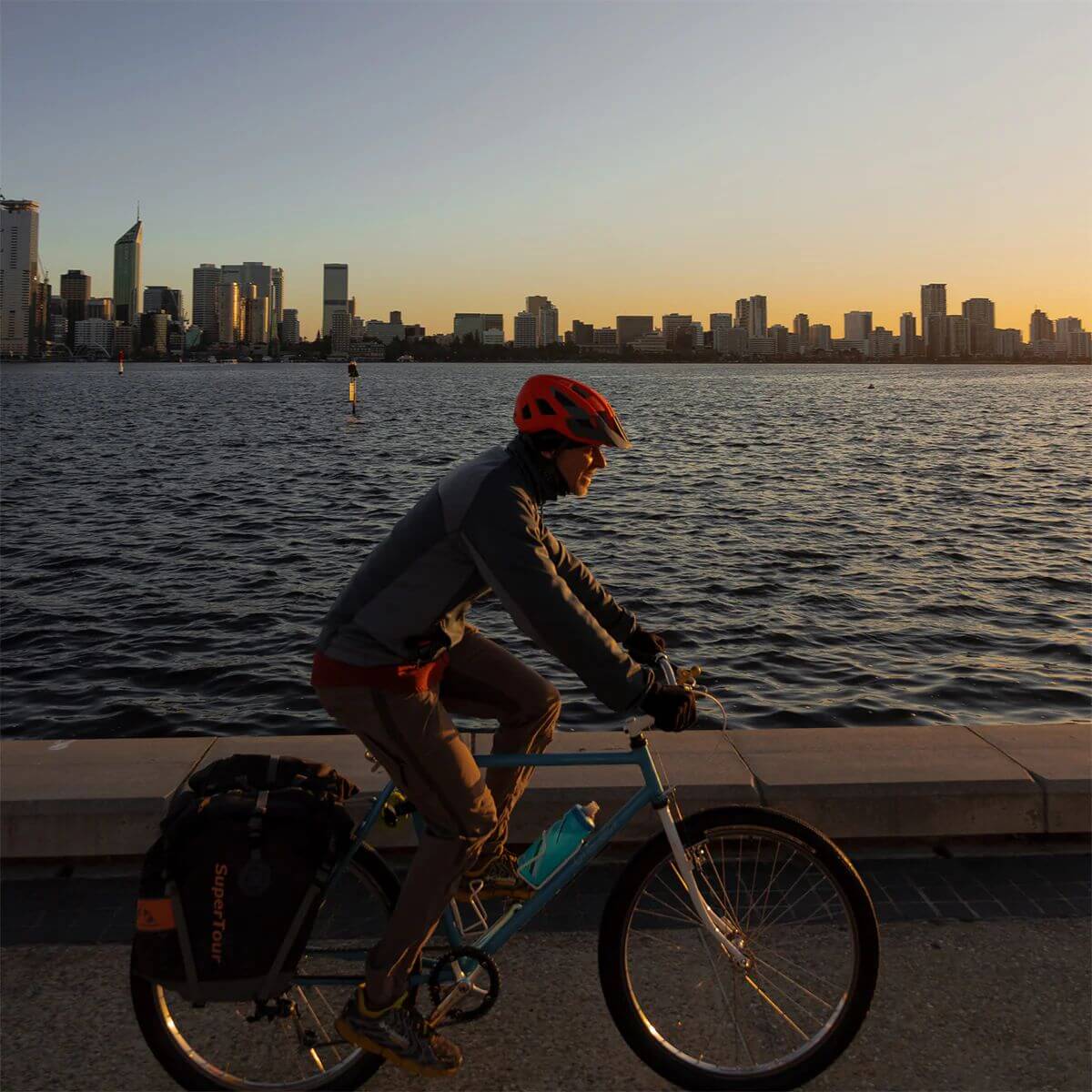 product manager cycling along the river