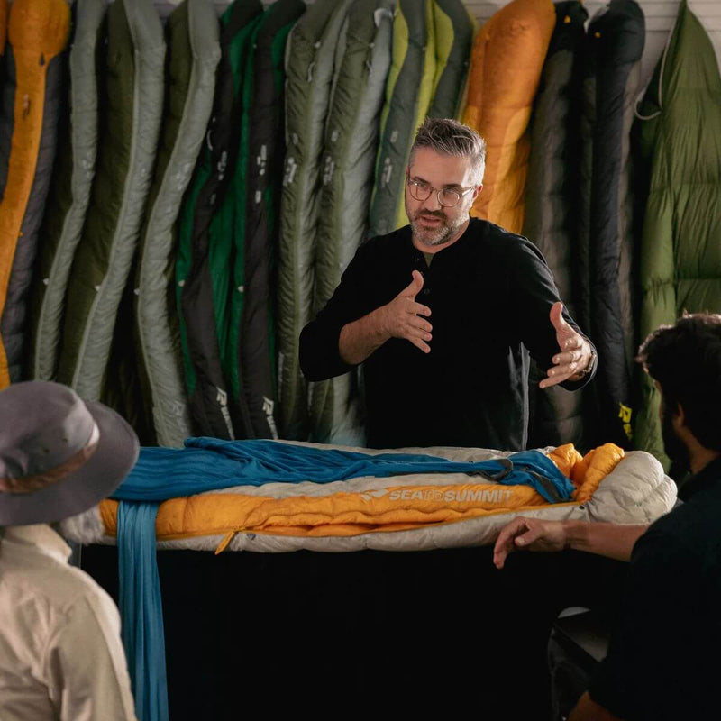 Product designer Dave Thompson with sleeping bags